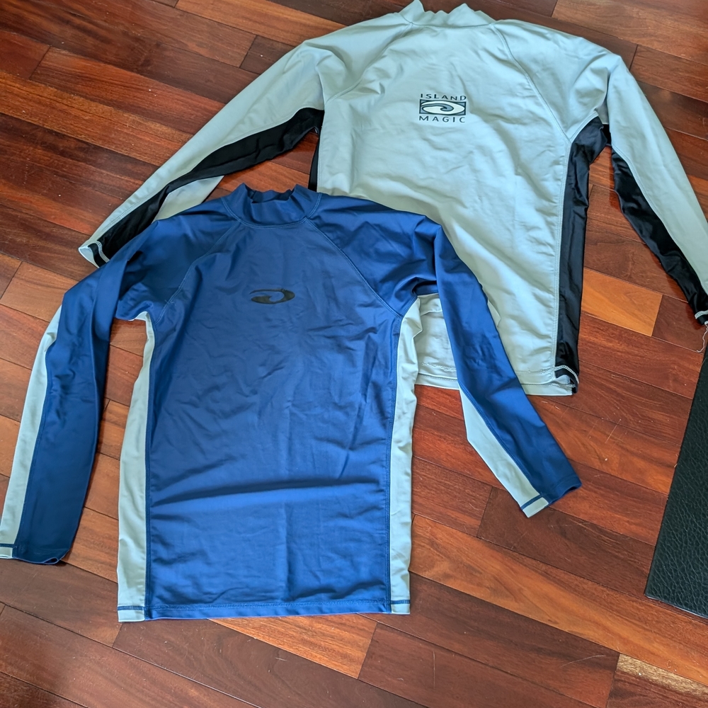 O'Neill Navy Rash Guard - one M and one XL